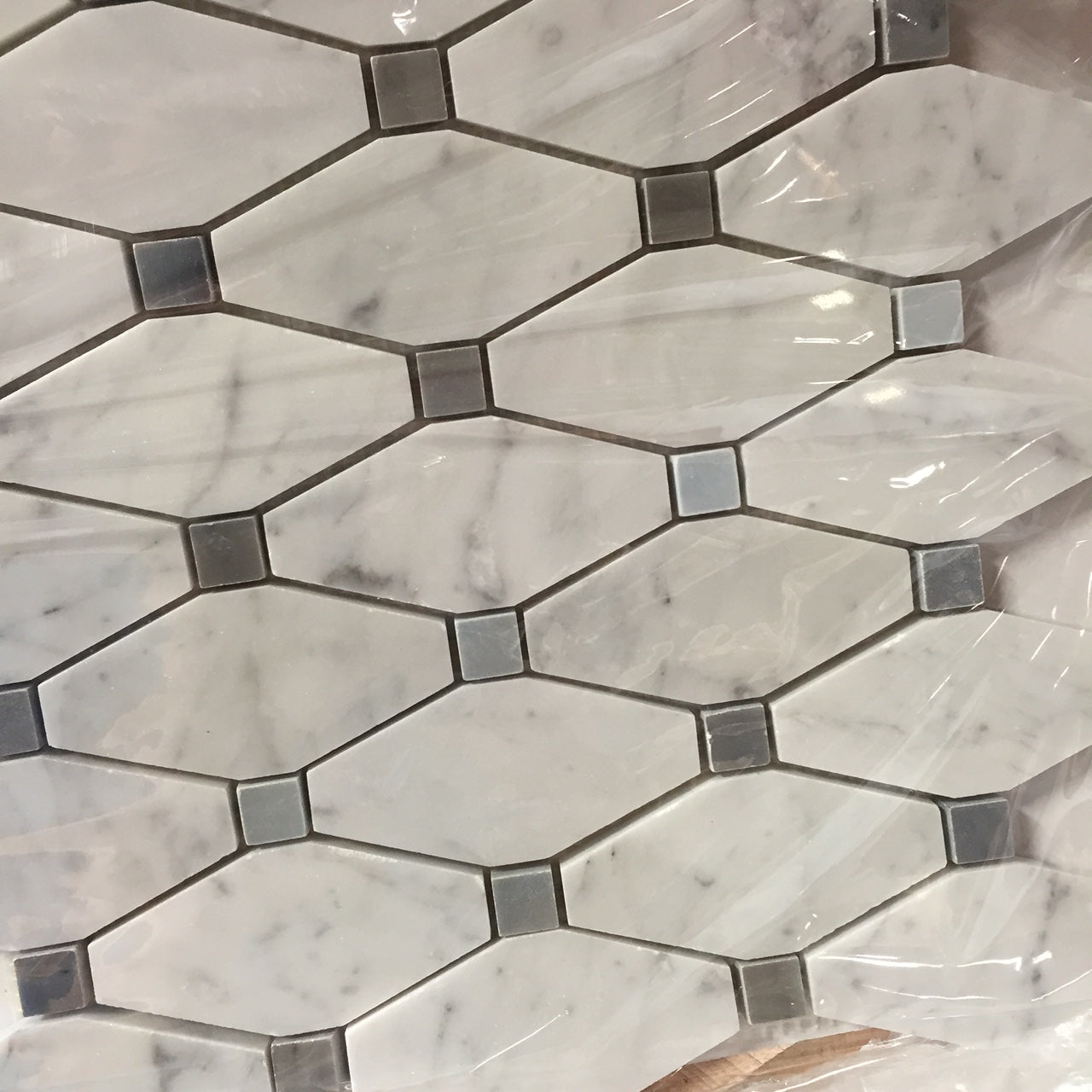 Carrara Italian Long Octagon w/ Blue - Gray Mosaic Backsplash and Wall Tile